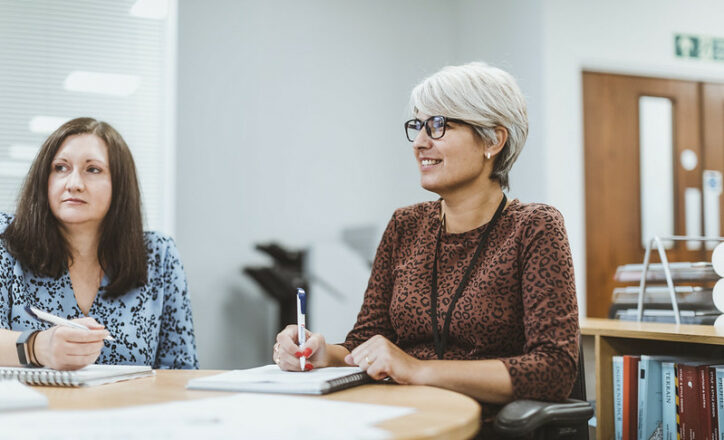 Shot of two members of Premier Modular office team in a meeting
